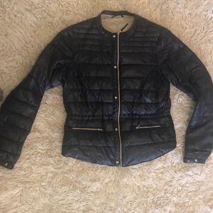 Lightweight, navy blue, synthetic puffer jacket